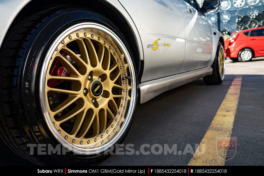 18x8.5 Simmons OM-1 Gold on Subaru WRX