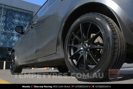 16x7.0 Starcorp Racing SR05 Satin Black on Mazda 2