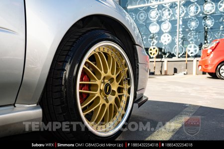 18x8.5 Simmons OM-1 Gold on Subaru WRX
